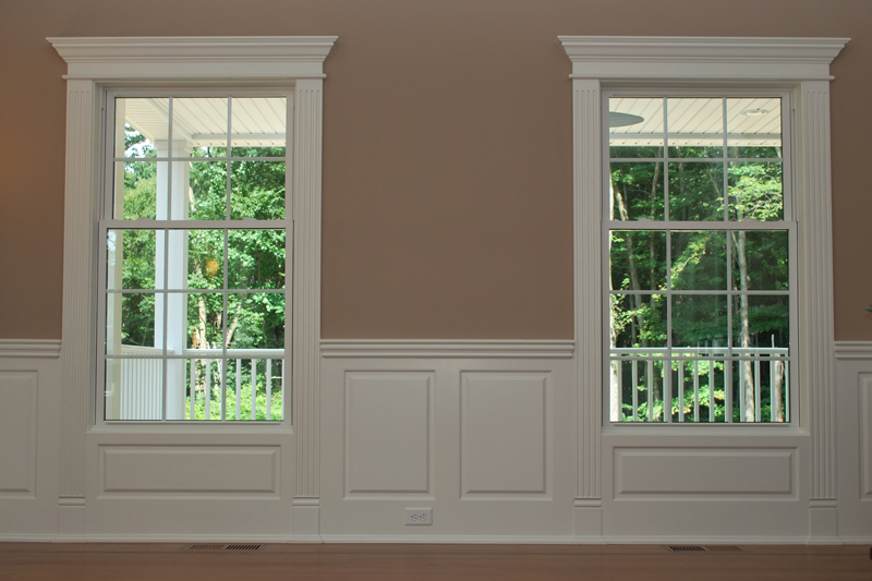 Integrate Window And Door Trim With Wainscoting Panels