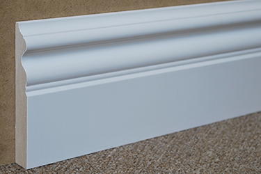 Primed baseboard Primed baseboard