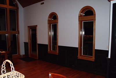 Classic Raised Panel Wainscoting Panels painted black in a kitchen.  Raised Panel Wainscot by Wainscoting America project 7421-1