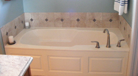 Wainscoting America Raised Panel Wainscoting for a bathroom Jacuzzi tub.  Custom Wainscoting Solutions Affordably Priced