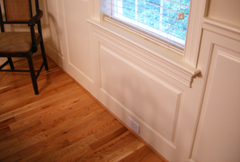 Wainscoting America Raised Panel Wainscoting - Close up view of window trim and wainscoting
