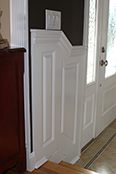 Beaded Raised Panel Staircase Wainscoting in a Foyer in Bellmore New York NY