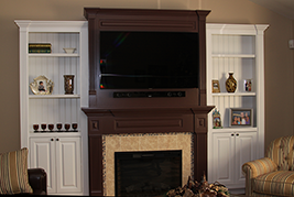 Mantel with built in Entertainment Center and Built In Bookcases in a Living Room in Bellmore New York NY
