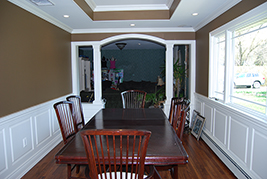 Wainscoting classic raised panel in a dining room in Oakdale Long Island New York.  Wainscoting Ideas by Wainscoting America