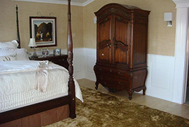 Classic Raised Panel Wainscoting in a bedroom.  Wainscoting ideas by Wainscoting America