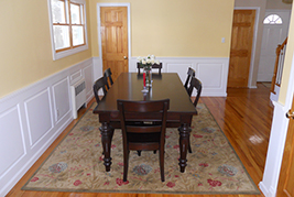 Wainscoting classic raised panel in a dining room in Glen Head Long Island New York.  Wainscoting Ideas by Wainscoting America