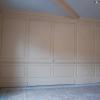 Full Wall Raised Panel Wainscoting with Hidden Door