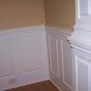 Raised Panel Wainscoting in a hallway with a bumped out wainscoted column