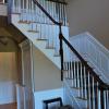 Raised Panels in foyer and staircase with a beautiful 3 1/4" poplar wood top cap molding.