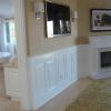 Classic Raised Panel Wainscoting in a Bedroom with a fireplace