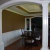 Raised panel wainscot in a dining room with raised panel columns