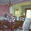 Classic Raised Panel Wainscot Dining Room in Fairfax, VA.  The half wall wainscot panels separate the dining room from the living room.