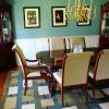 Classic Raised Panel Wainscoting in a Dining Room in Fairfield NJ with the panels painted white with Benjamin Moore Satin Impervo oil based paint.