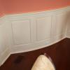 Classic Raised Panel Wainscoting in a Dining Room located in Watertown, CT.  This curved panel was made with PVC