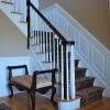 Beaded Raised Panel on staircase and in foyer.  Notice how the staircase panel on the landing is about  34" and the back side of the landing panel is much taller.