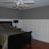 Beautiful double stacked wainscoting in a bedroom in Wolcott, CT.