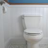 Beadboard wainscoting in a half bathroom