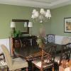 Classic Raised Panel Wainscot picture in a dining room in Farmington, NY with green painted walls and a mahogany dining room set