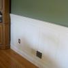 Beaded Recessed Wainscot in Newark, DE,  The stile stops just before the Air Duct so the duct can straddle both inner panels.  The paneling is painted white and the wall is painted green