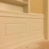 Curved Wainscoting under bookcase. Replica Office by Oval Office Design LLC.